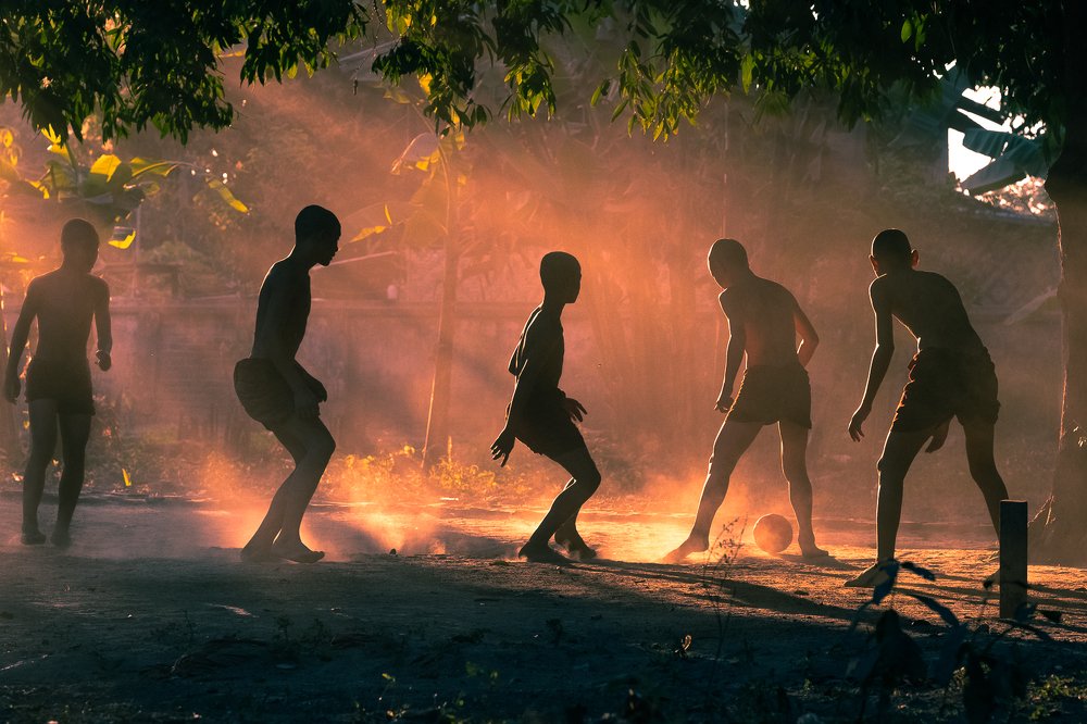 Playing under the epic sun light.