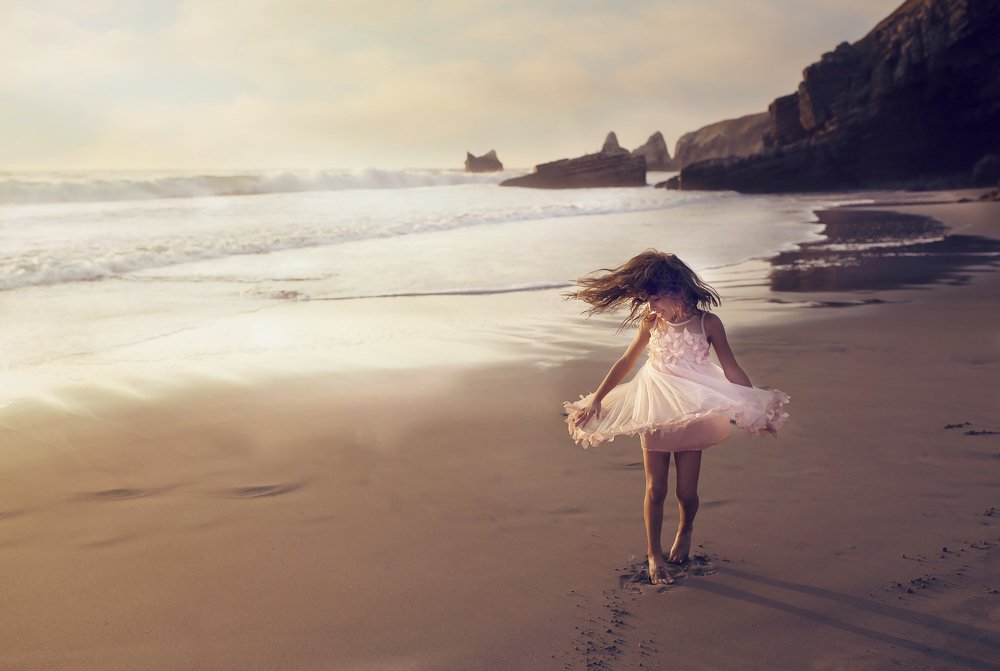 Girls with dresses at the beach