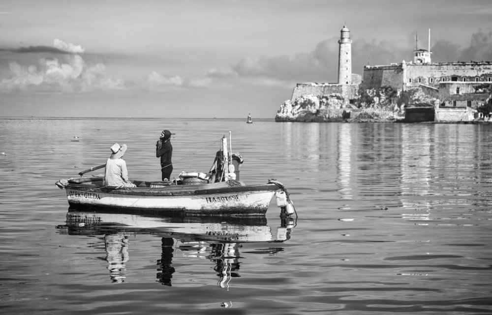 Fisherman at the bay