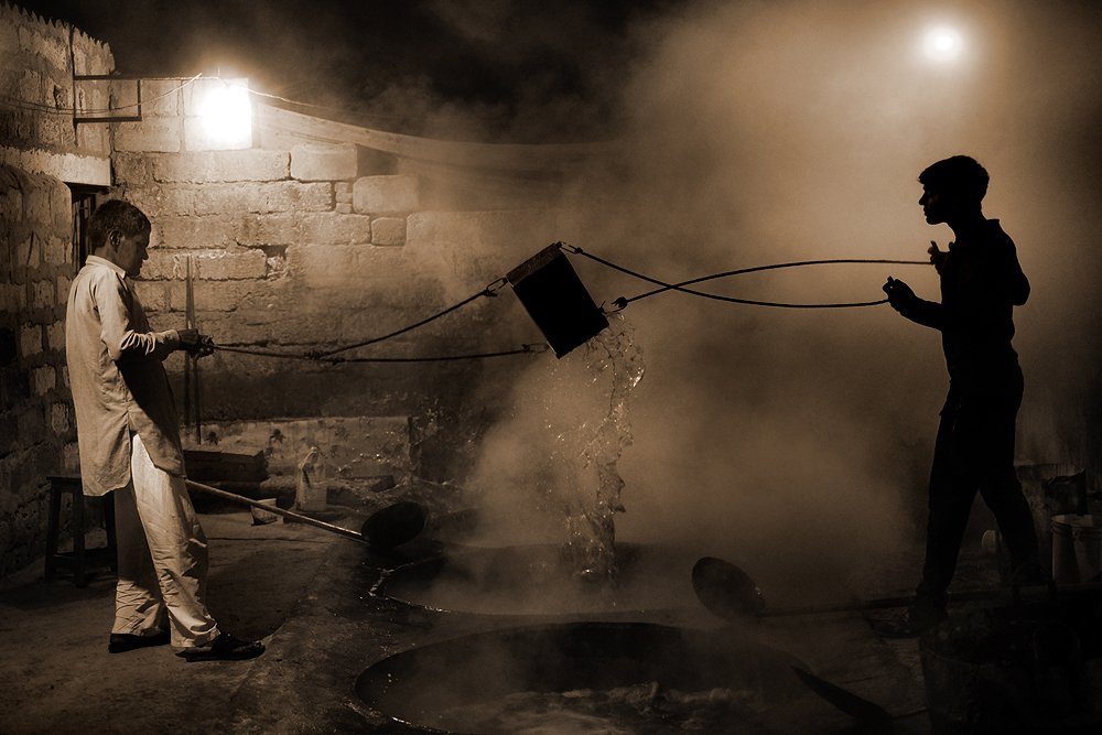 Two man are working in factory 2