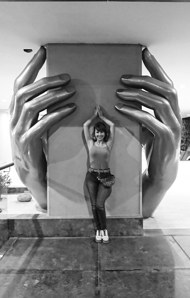 In the hands.