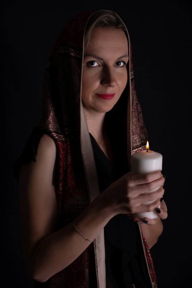 Mystery Women with candle