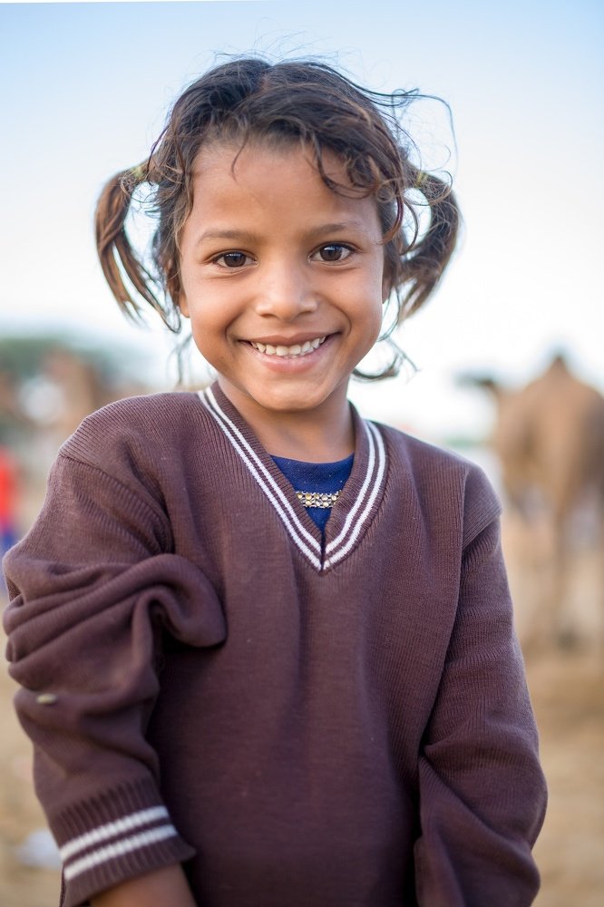 A little girl with a big smile