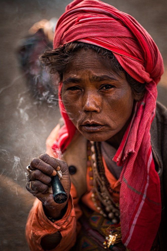 Lady sadhu taking a drag