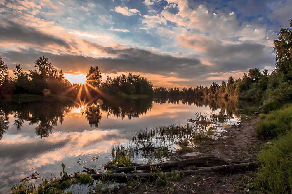 Август на реке Узакса