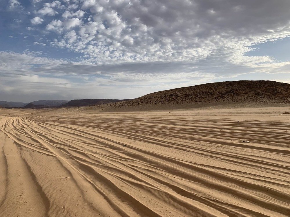 Песок, жара и облака