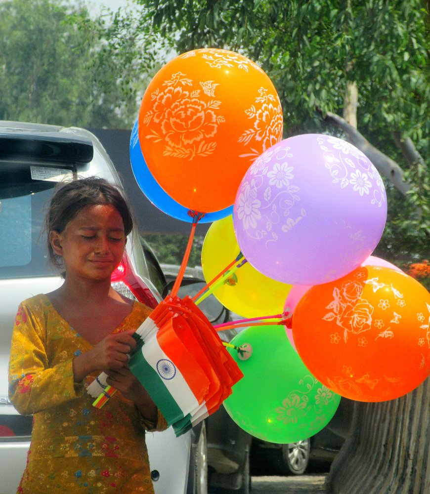 struggling balloon seller baby Girl