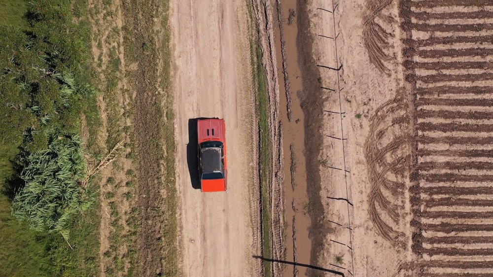 Orange Chevy traveling