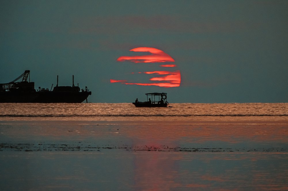 Fisherman and the Sun