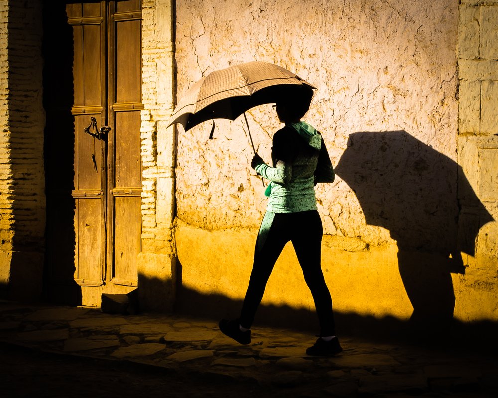Umbrella´s Shadow Running Away