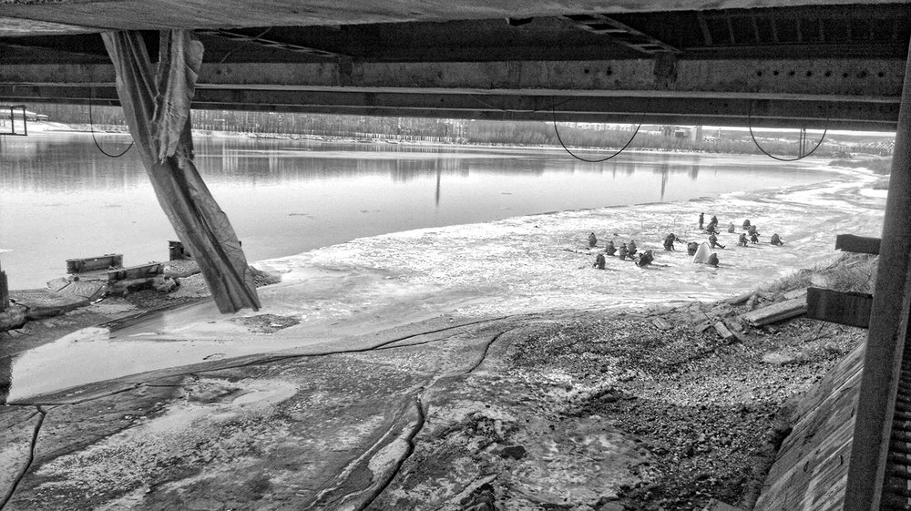 April under the bridge of big river.