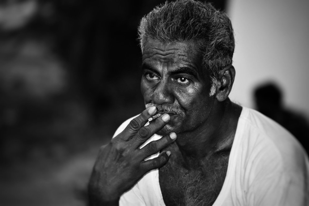 Old man with regional cigarette