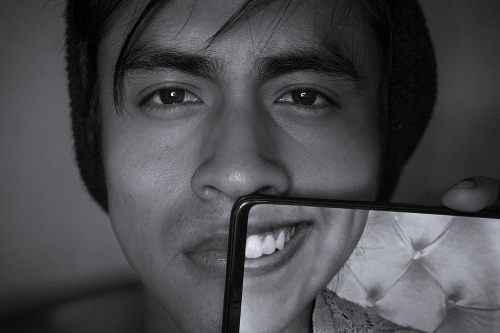 Tu sonrisa en la mía