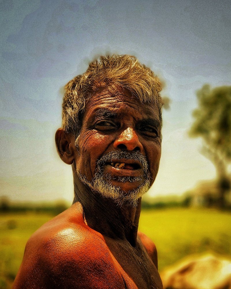 Village old man with strange expression