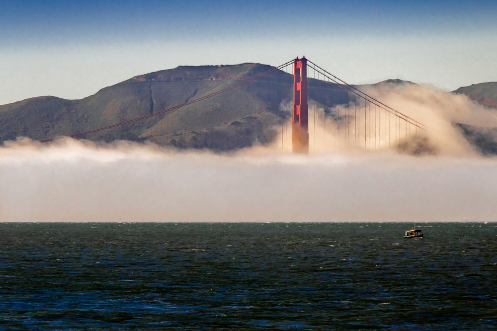Golden Gate Bridge under the fog.