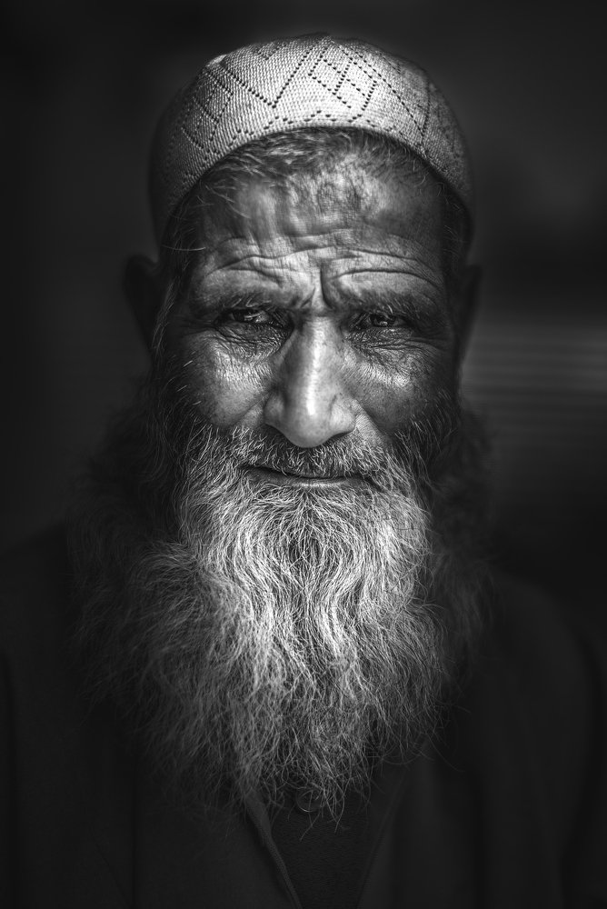 Old muslim man with long beard