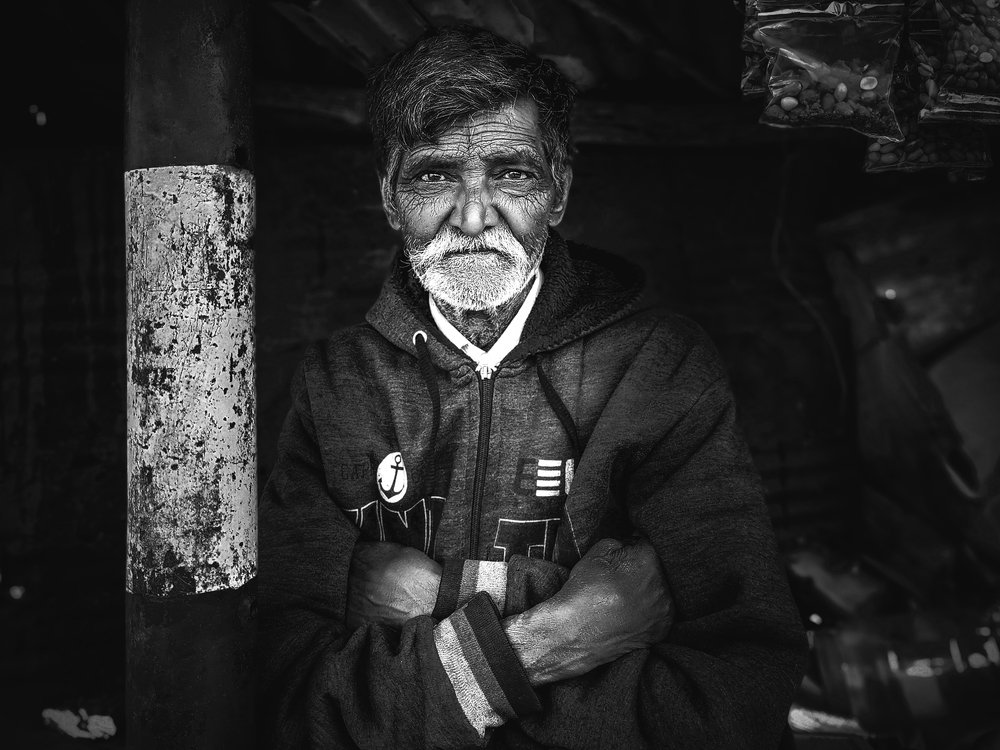 Shopkeeper waits for customer