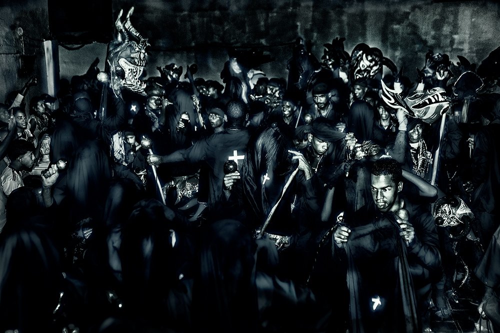 In front of the altar