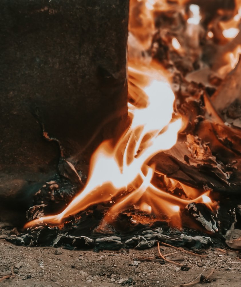 Fire, flame, so beautiful and hot. His eyes attract you like a beautiful ball of fire at sunset