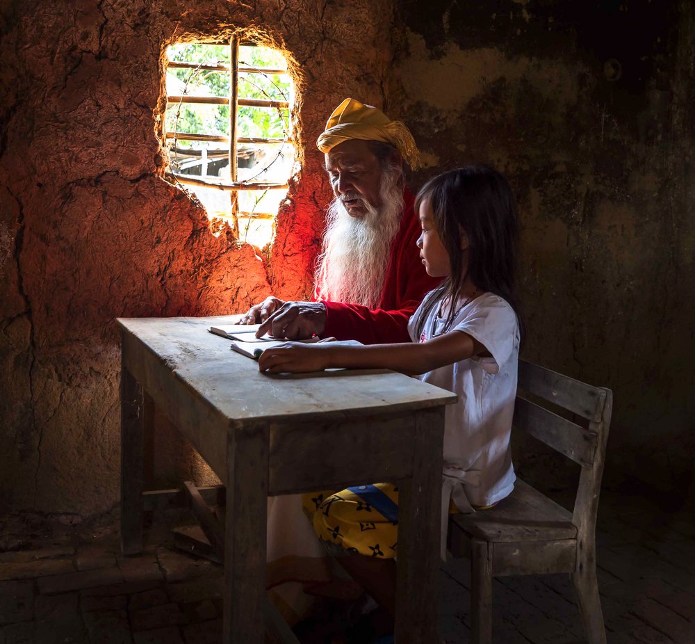 grandfather and grandsgirl at home