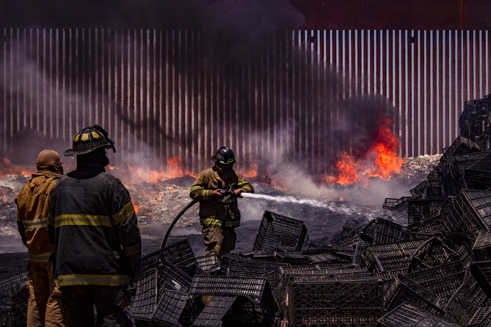 Border wall on fire