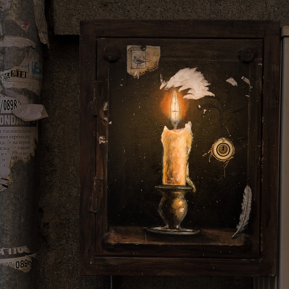 in the light of a paper candle