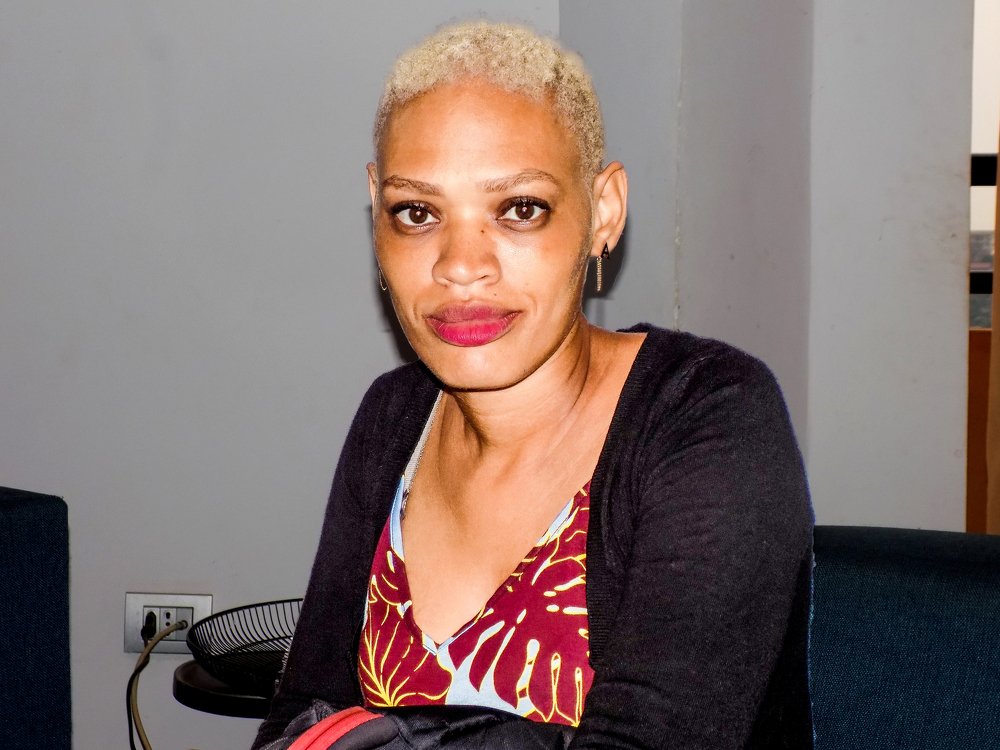 Portrait of a young Cameroonian woman and albino
