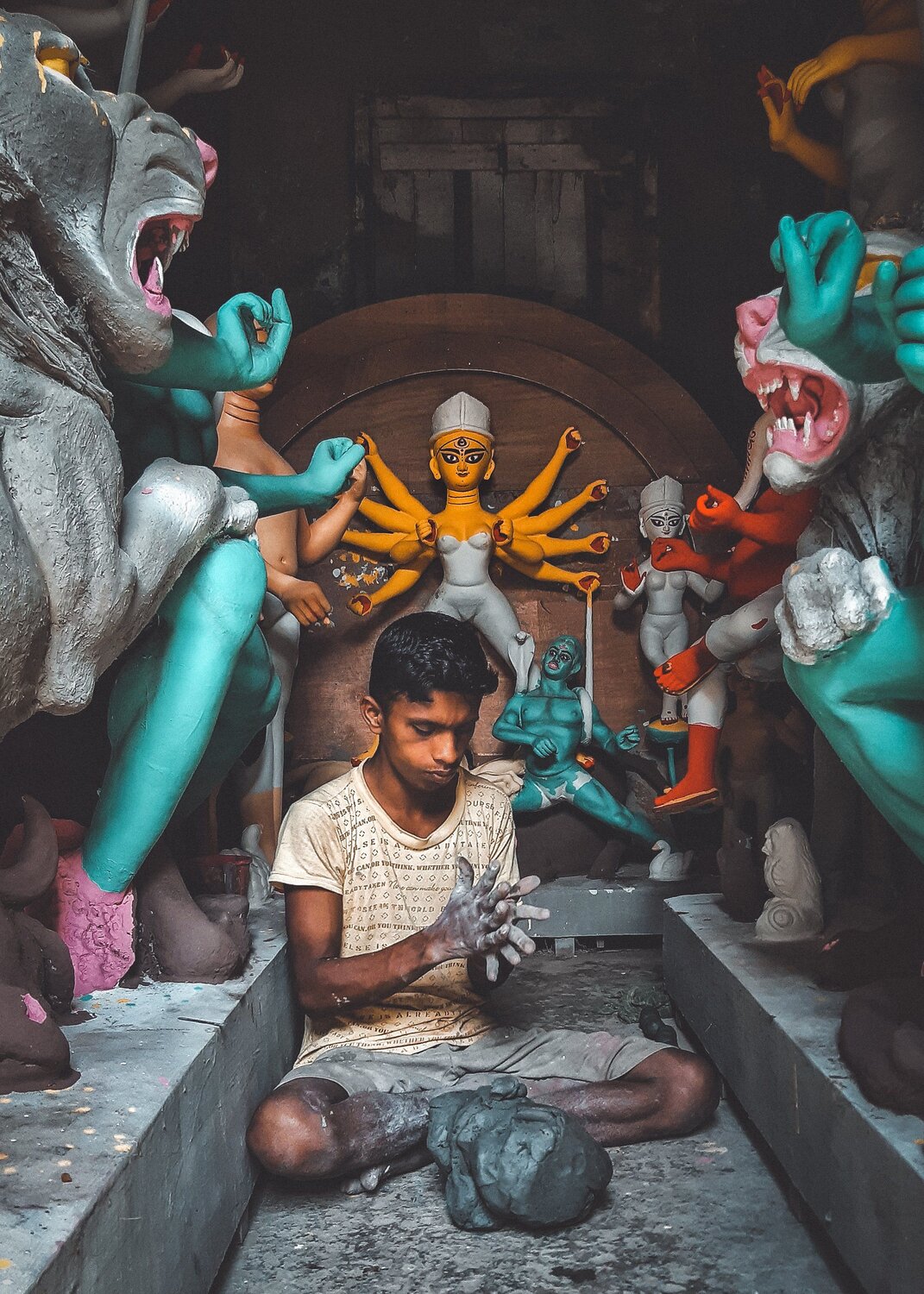 Sculptor who makes God.