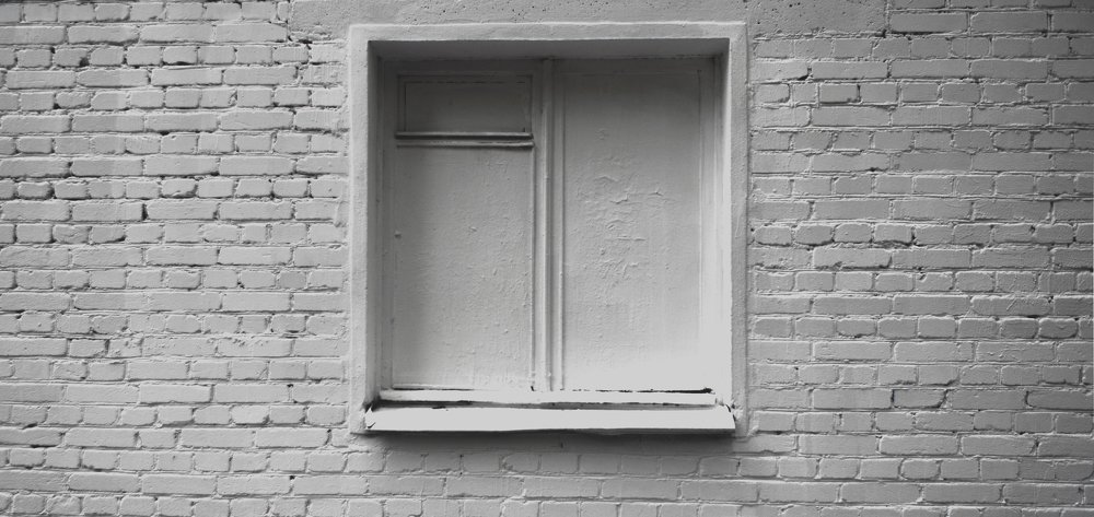 Behind the white