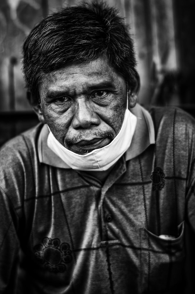 Old man by the side road