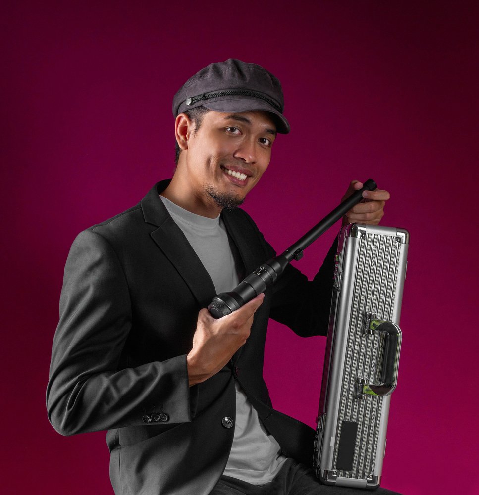 Photographer's Portrait with his lense.