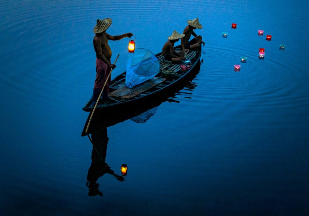 Fisherman at night