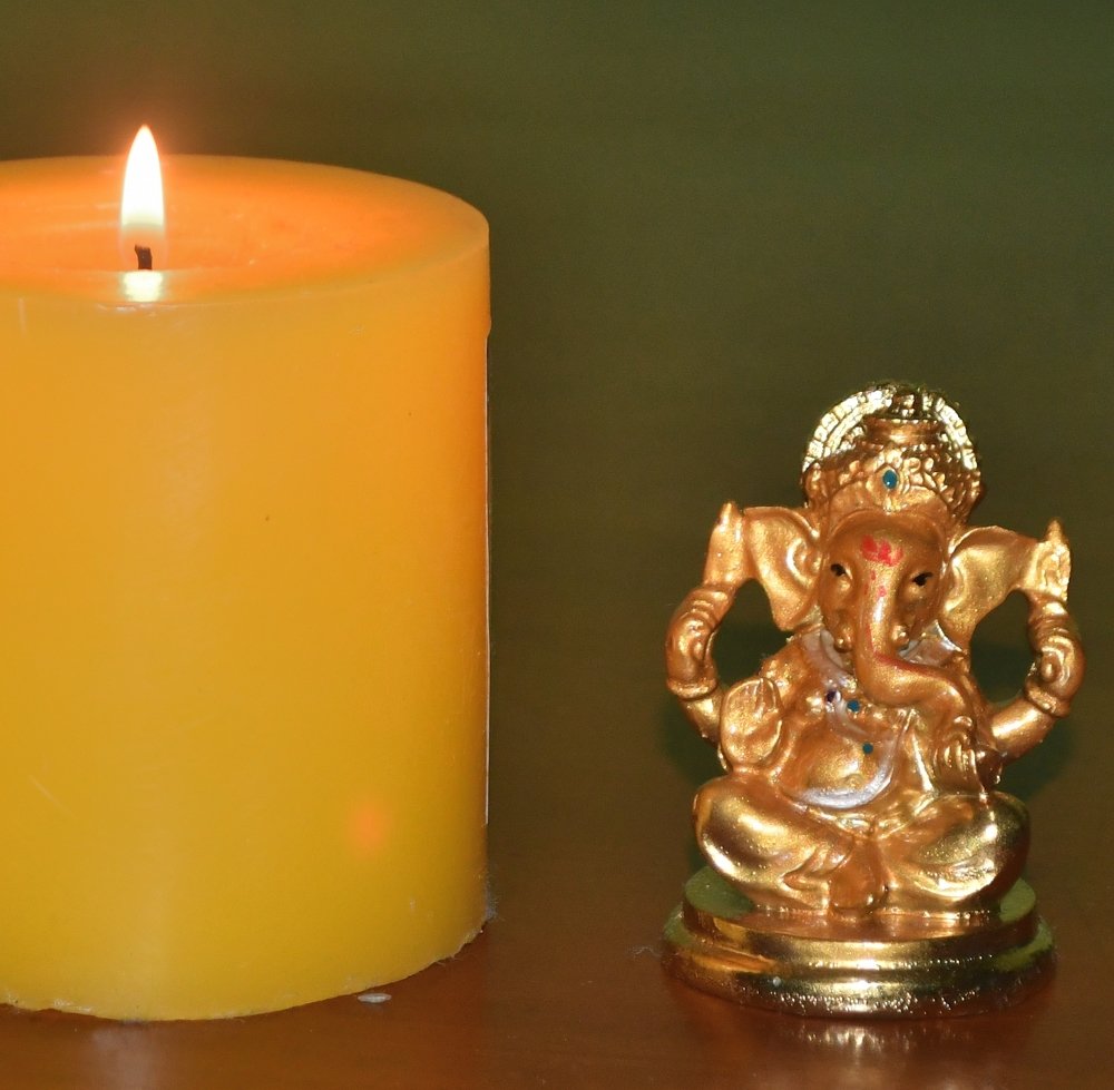 Candle with Lord Pillayar