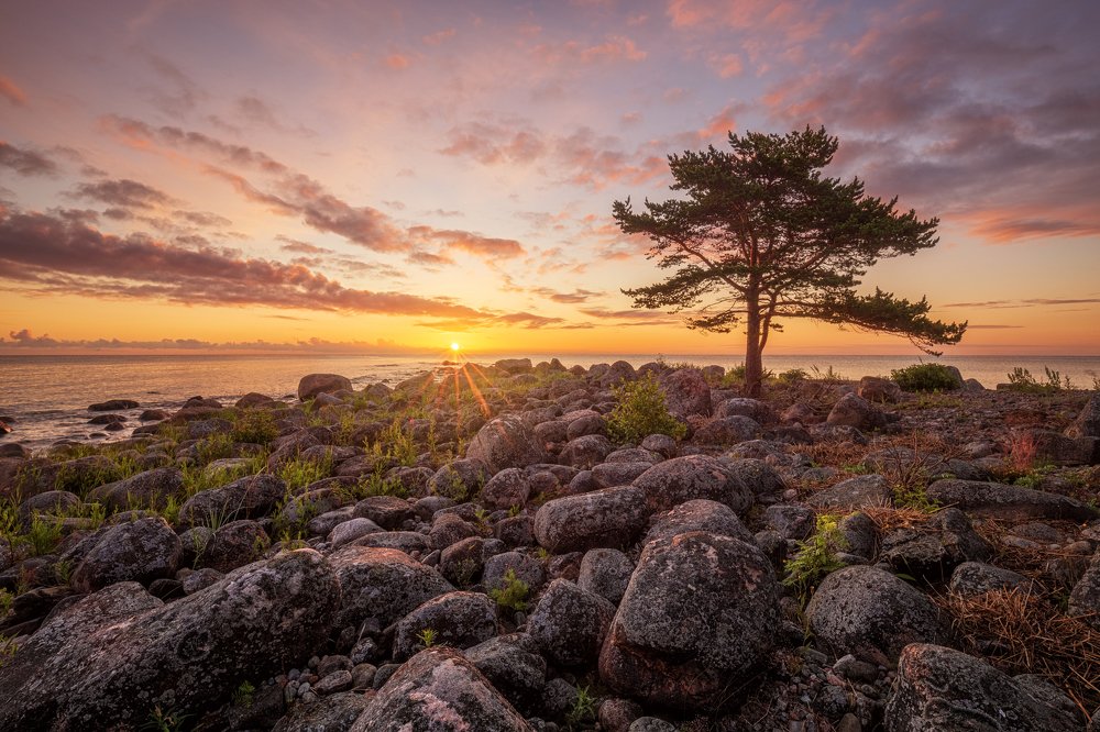Amazing sunrise over the beach on Baltic sea.