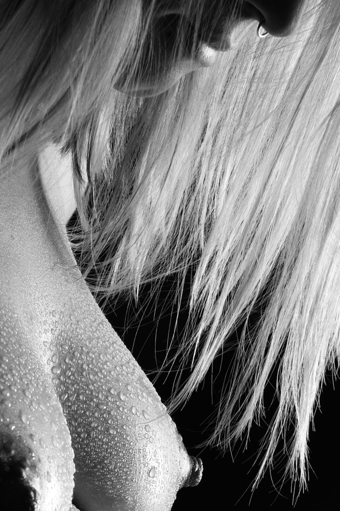 the beauty of water drops on a female body