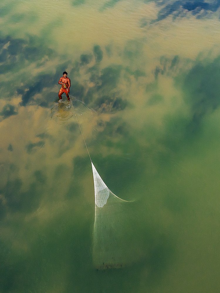 Fishing from cloudy sky