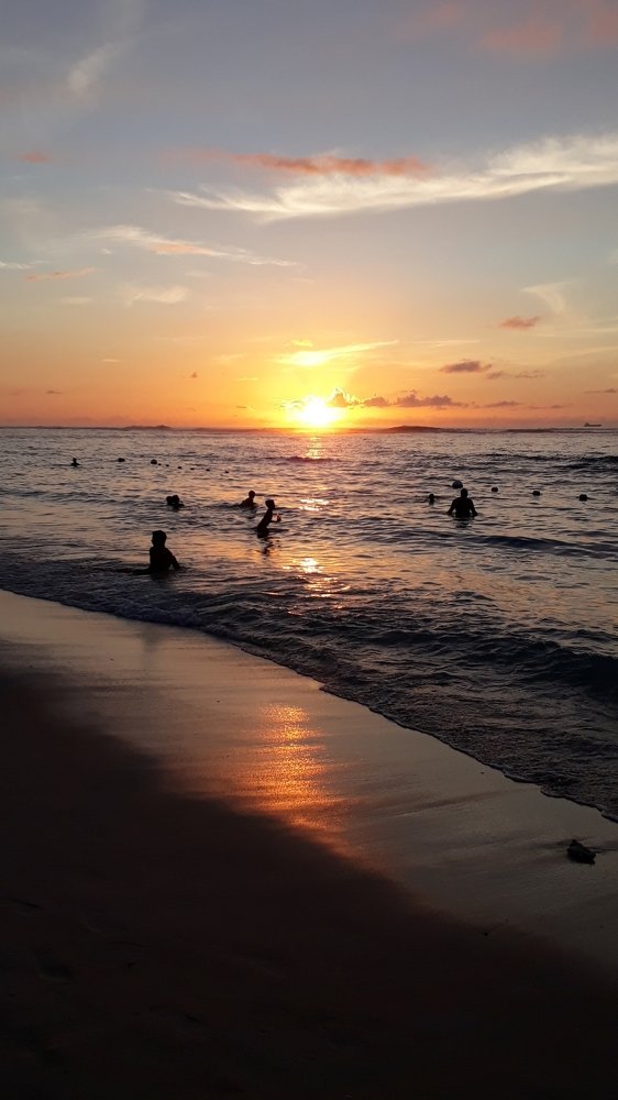 Flic en Flac public beach at sunset