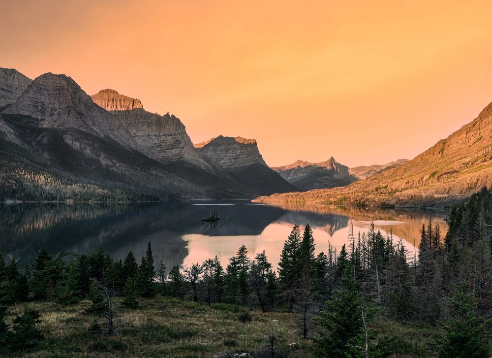 A mountain range by the lake