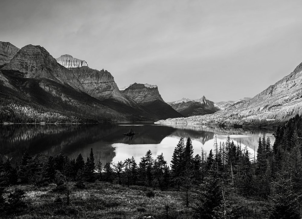 A mountain range by the lake