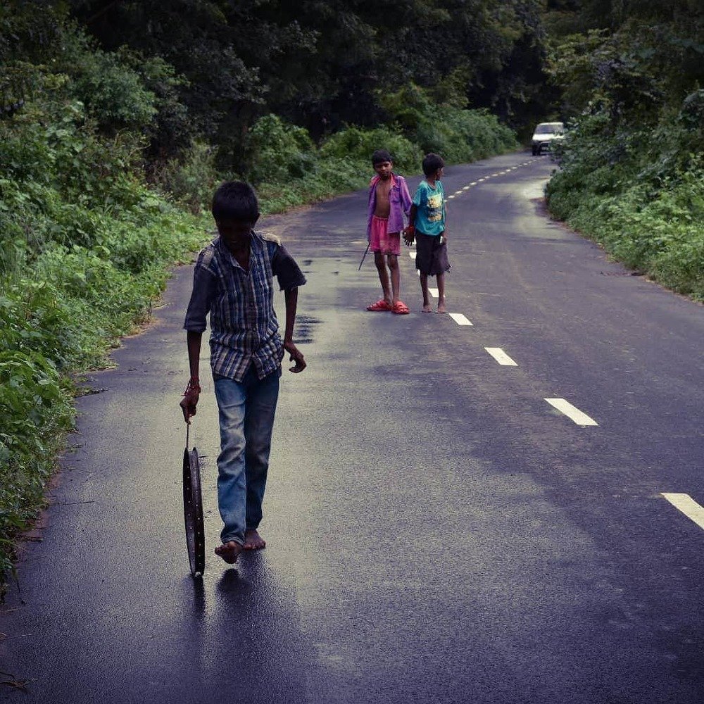 Childhood sports -Playing with tyre