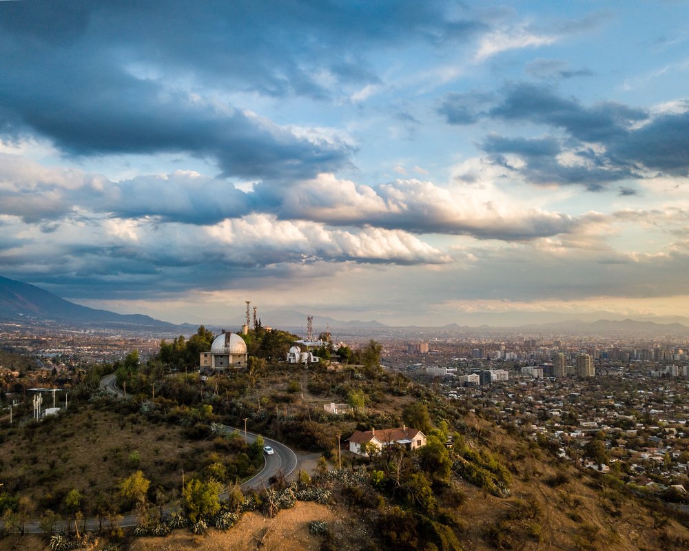 Clouds, city and telescope