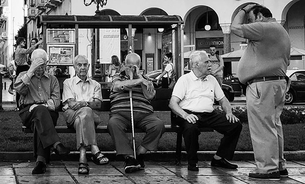 Old people are waiting for a bus that will never come...