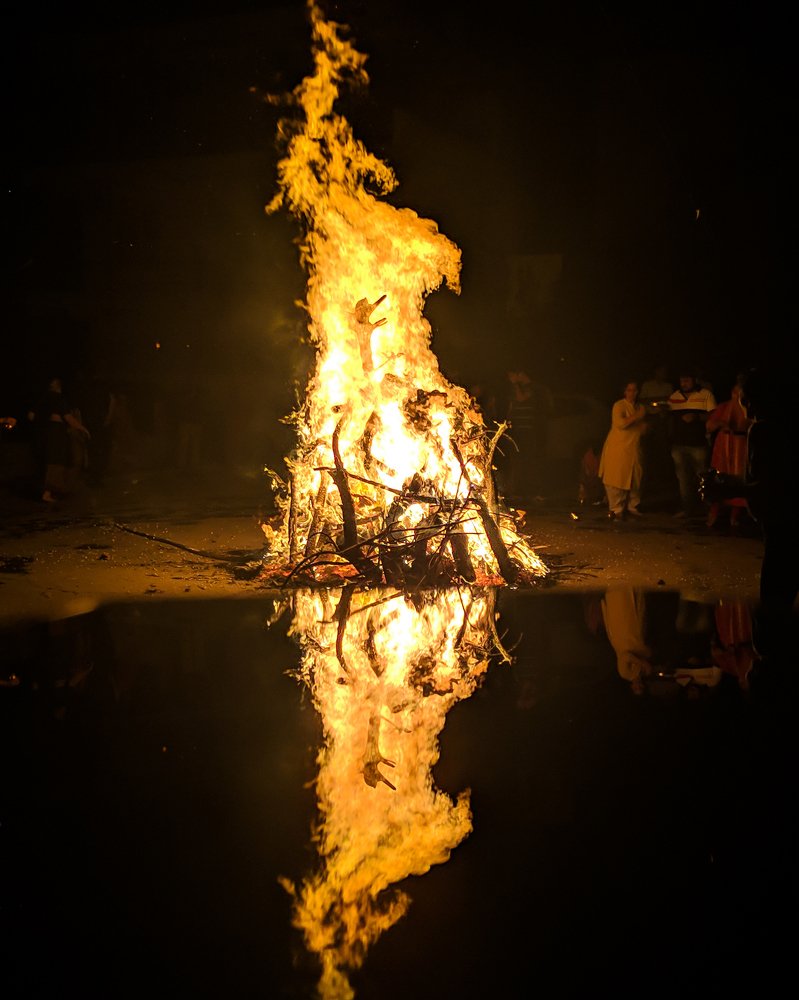 Holi fire reflection