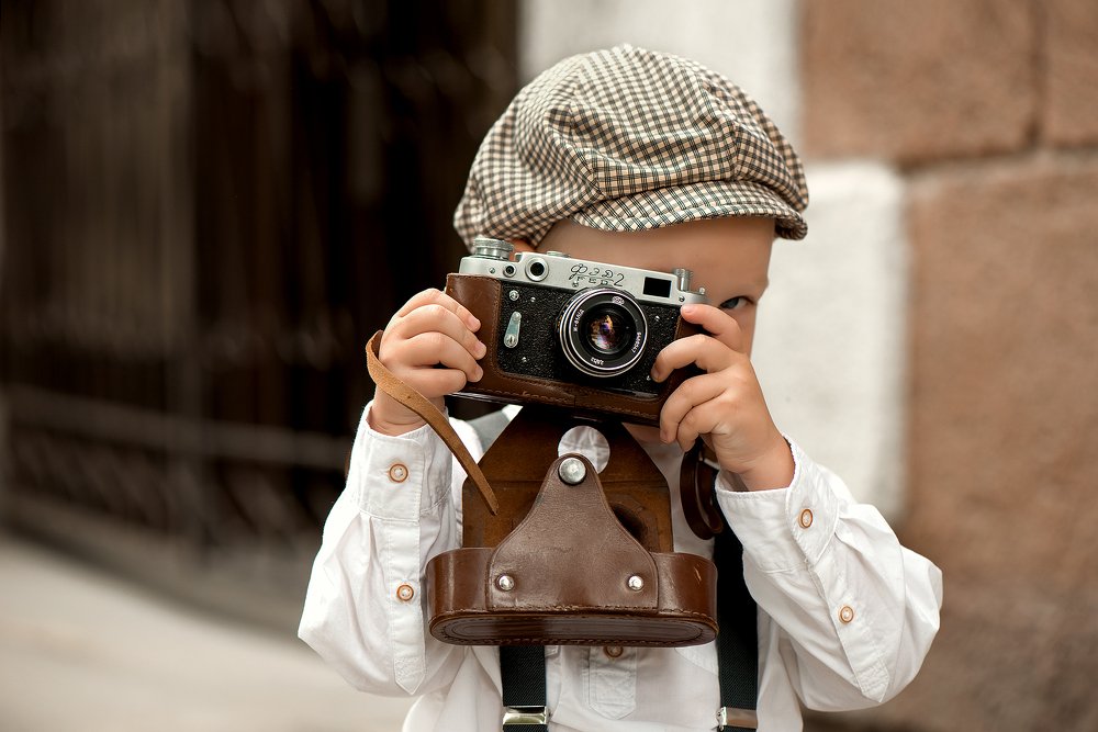 Юный фотограф