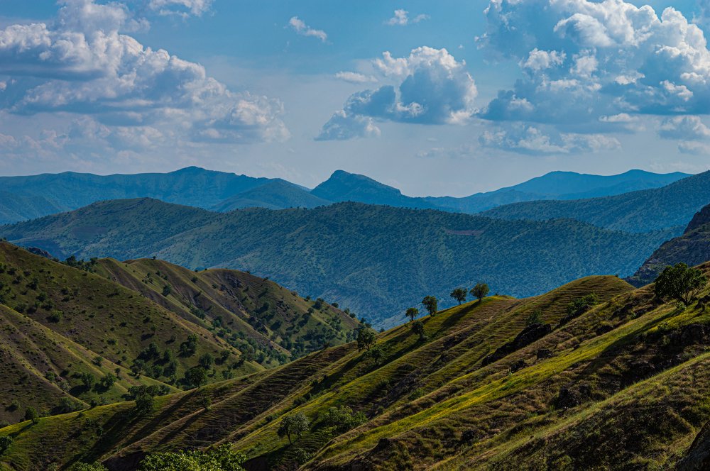 Mountains and Valleys meeting the Sky