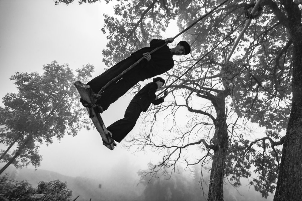 Two priests tested the safety of the swing game