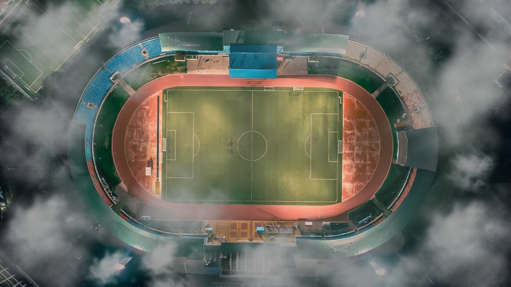 Soccer field through cloud