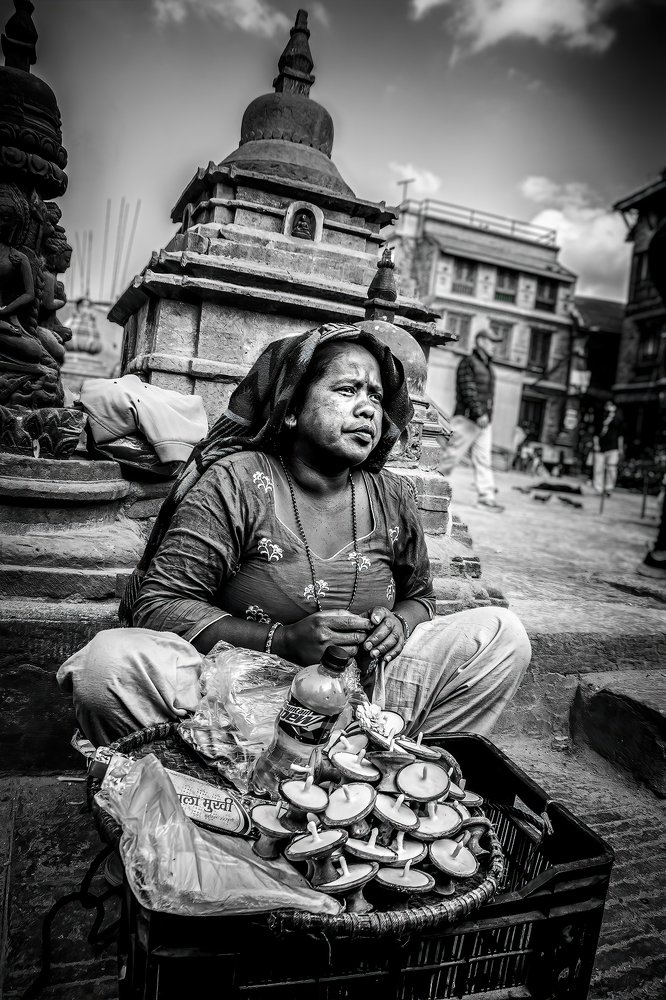 woman candles seller in Kathmandu