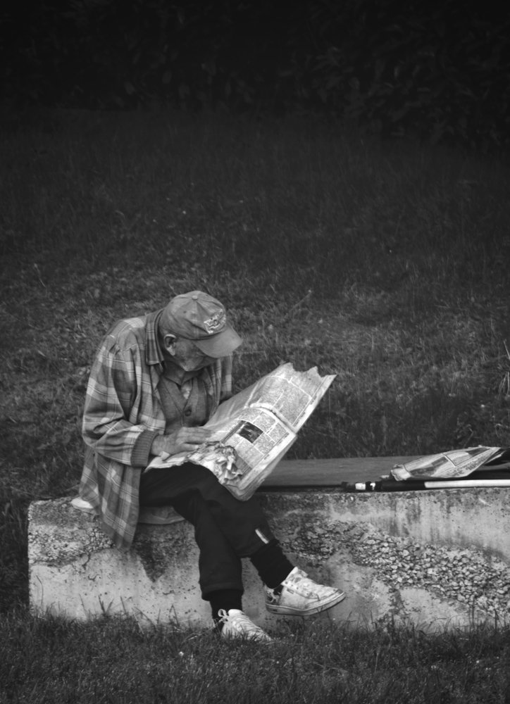 Man and burnt magazine