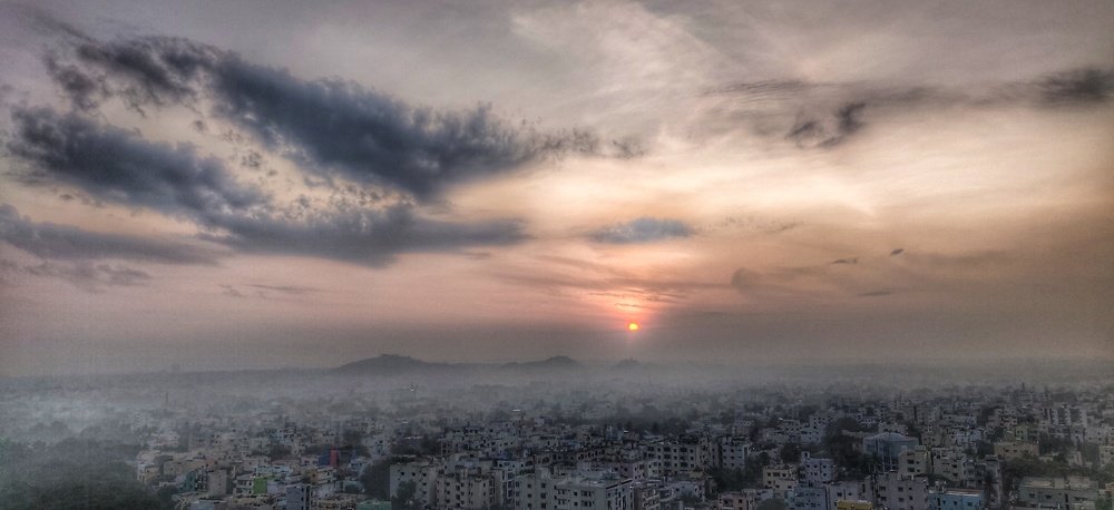 The Breaking of Dawn on a Foggy Morning.